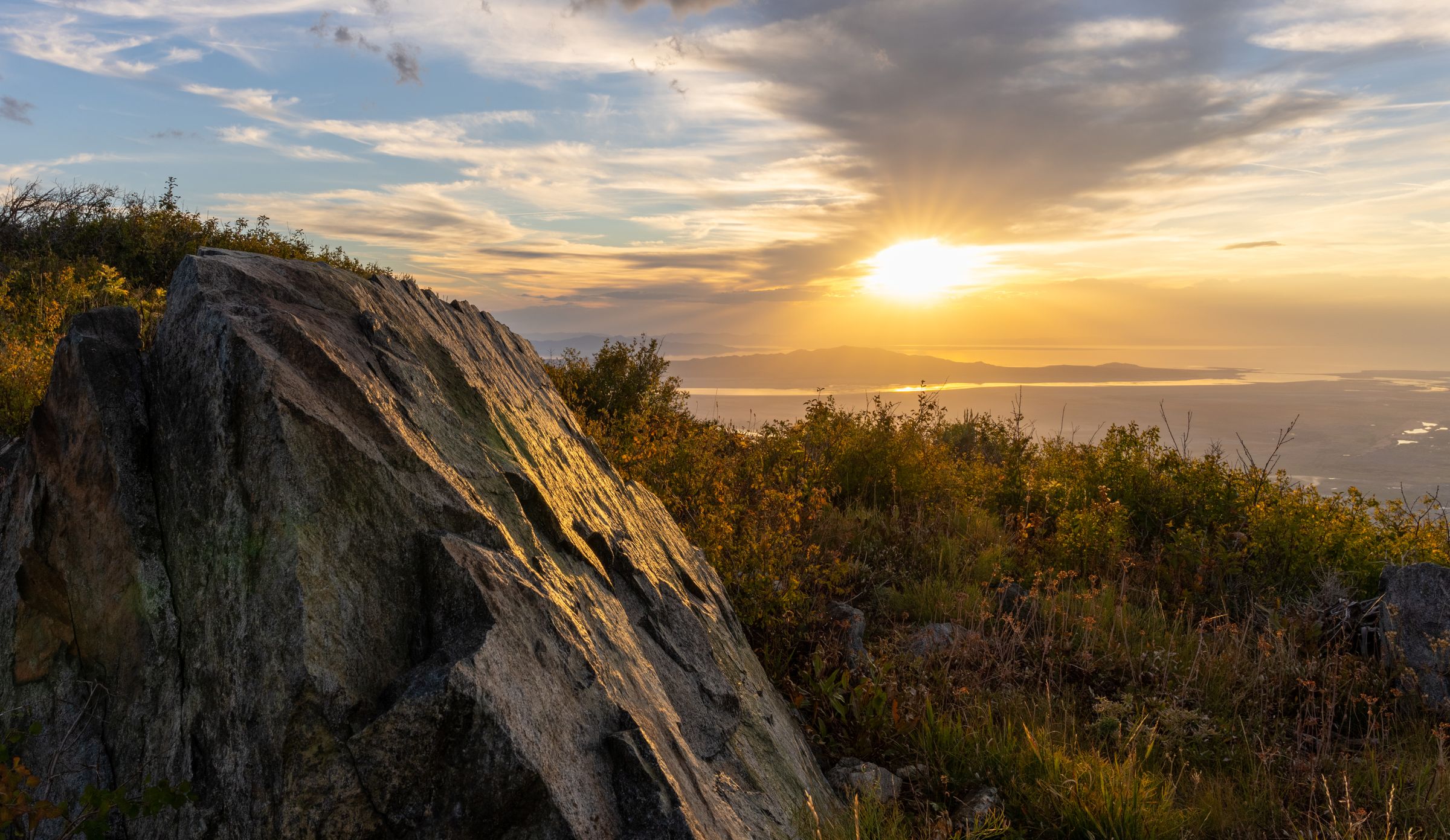 Sunburst over the Great Salt Lake from a rocky Utah ridge